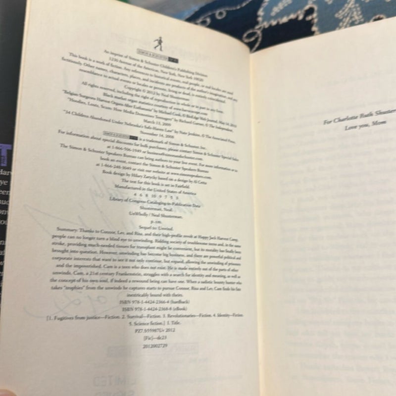 UnWholly (Numbered 464/500, Signed Special Edition)