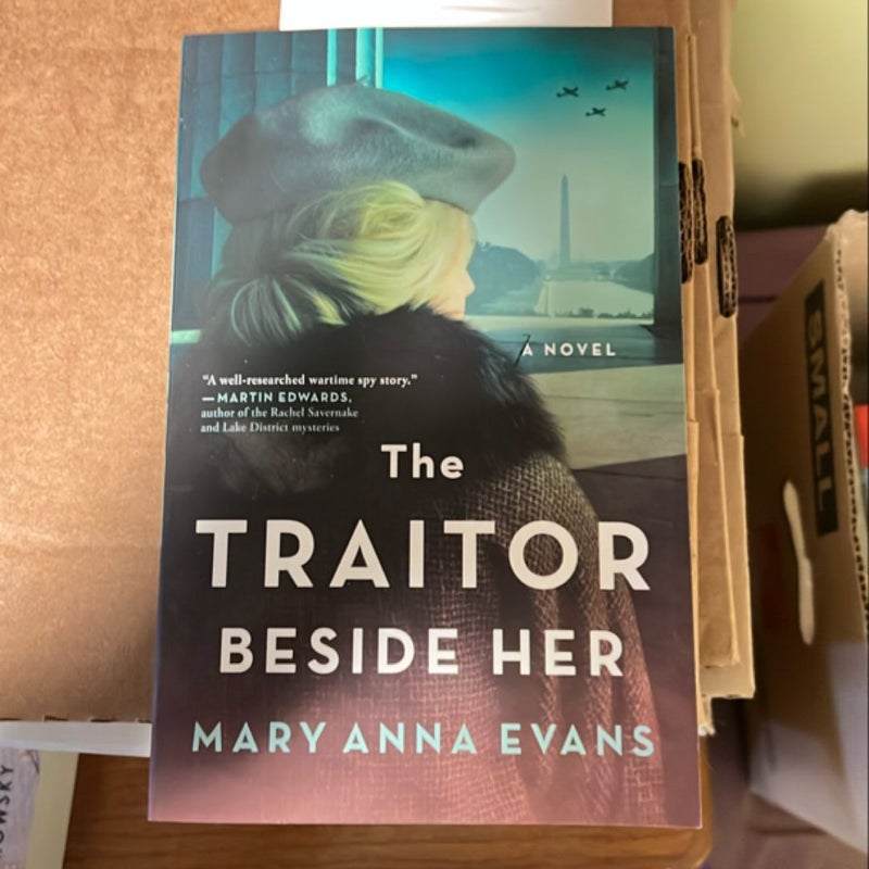 The Traitor Beside Her