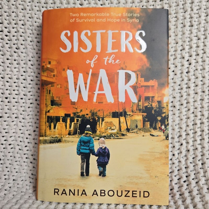 Sisters of the War: Life, Loss, and Hope in Syria (Scholastic Focus)