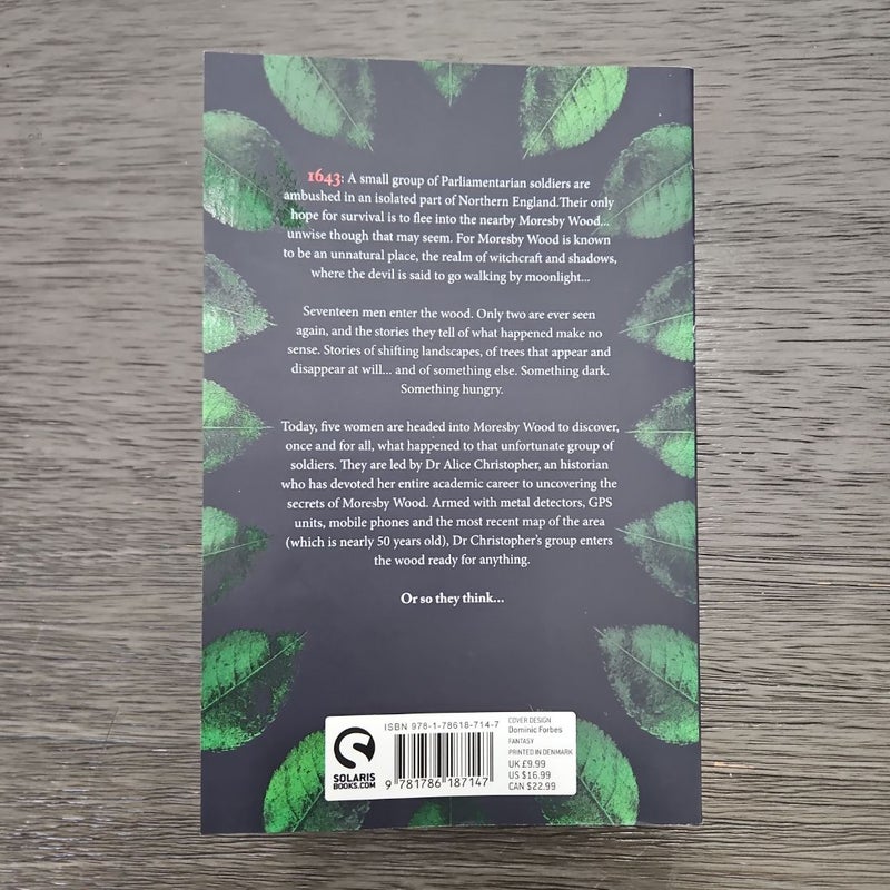 The Dark Between the Trees