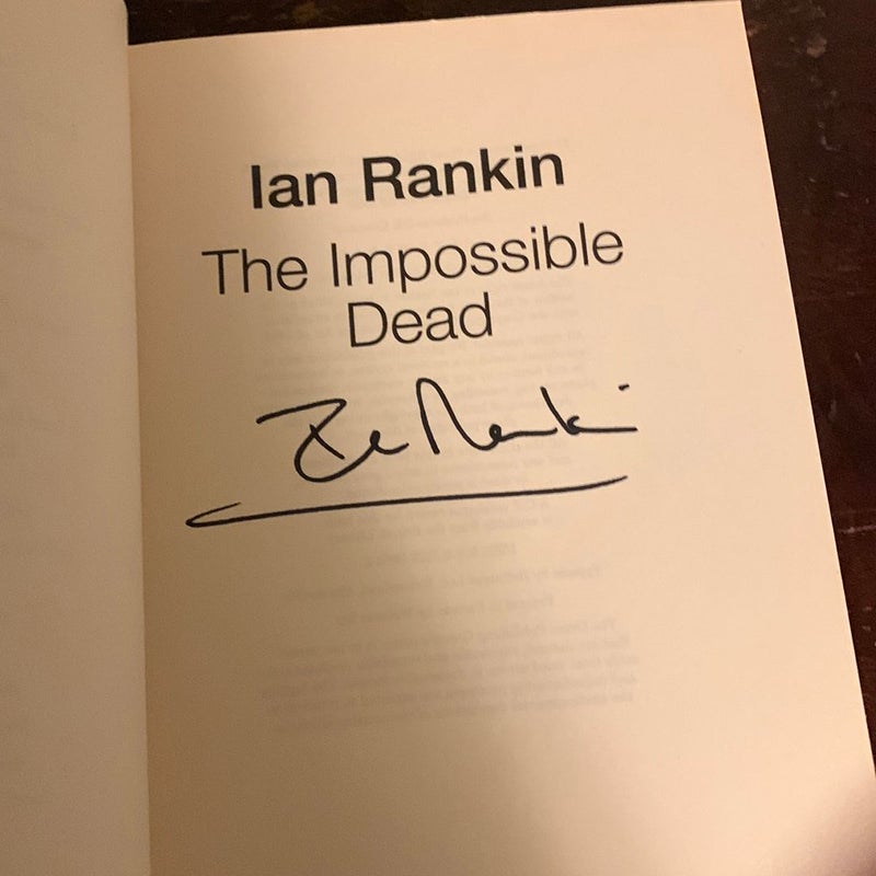 THE IMPOSSIBLE DEAD- SIGNED Trade Paperback!