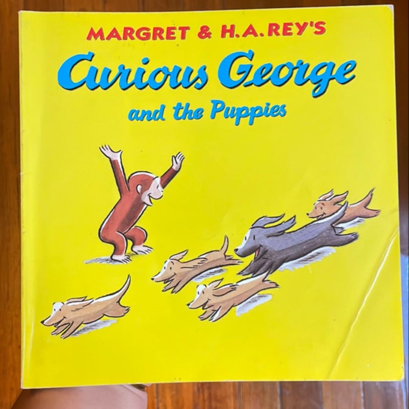 Curious George and the Puppies