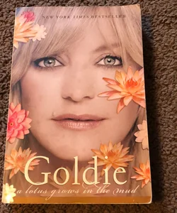 Goldie a lotus grows in the mud 