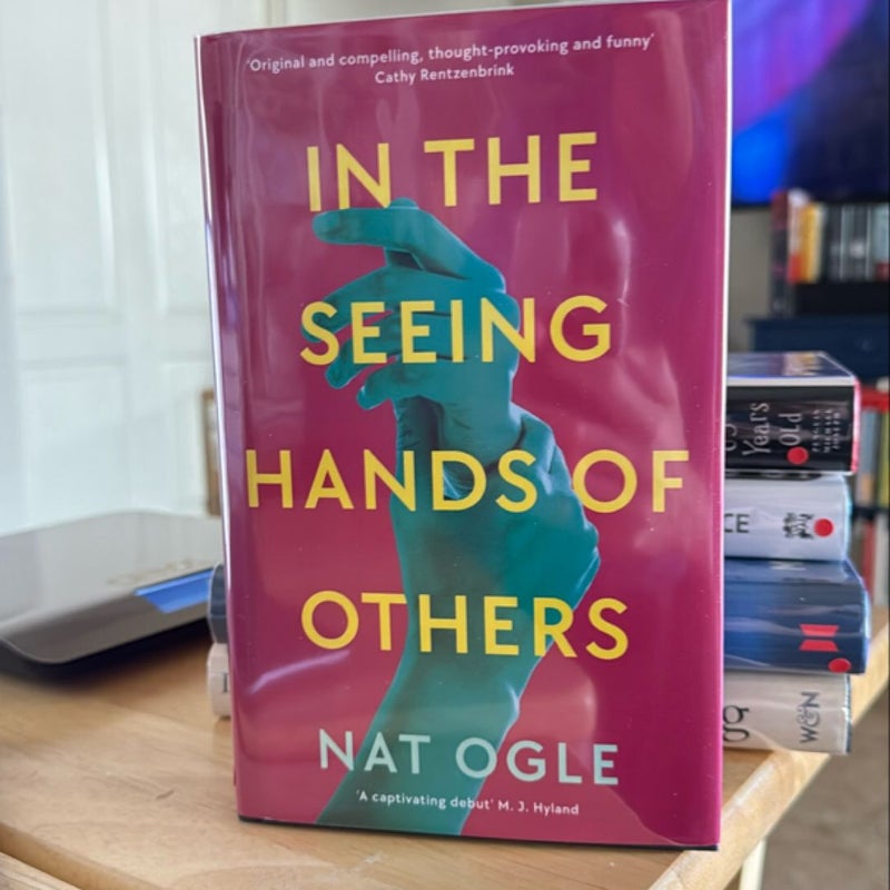 In the Seeing Hands of Others SIGNED