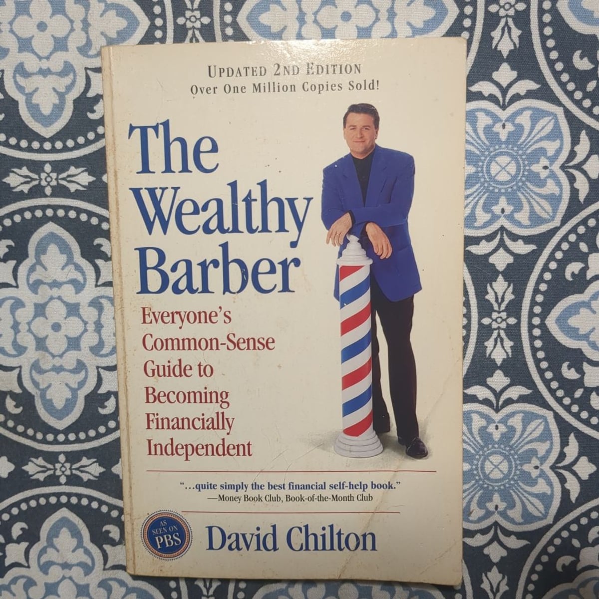 Book cover of The Wealthy Barber by David Chilton with a simple design