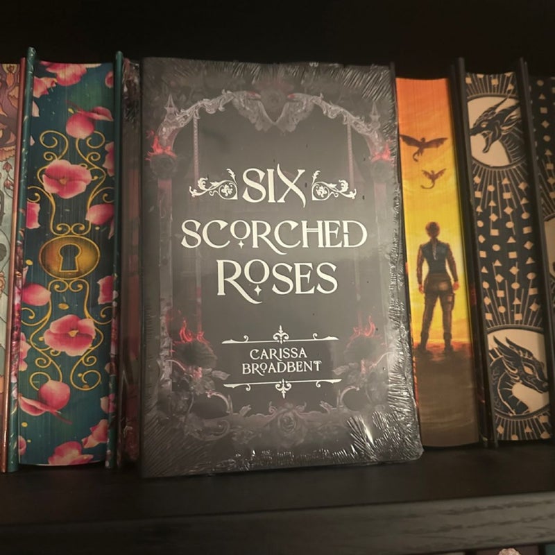 Six Scorched Roses