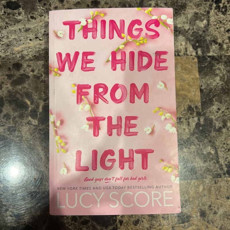 Things We Hide from the Light by Lucy Score, Paperback | Pangobooks