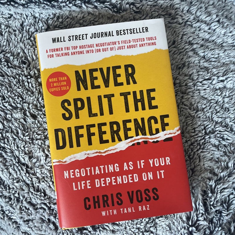 Never Split the Difference: Negotiating As If Your Life Depended On It Book  by Christopher Voss and Tahl Raz - Bella Bookstore