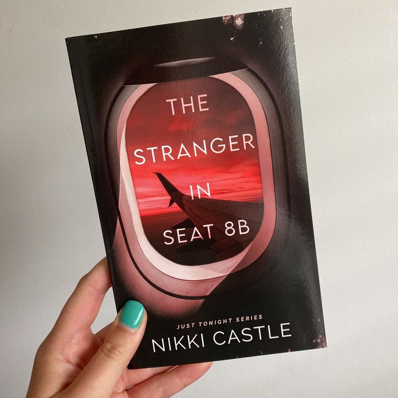 The stranger in seat 8B - signed