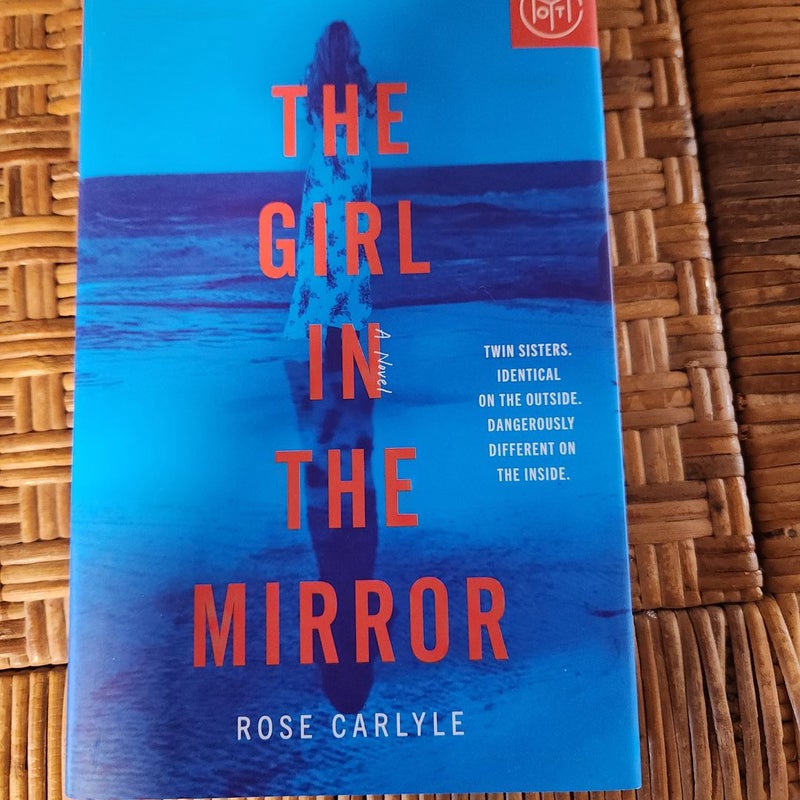 The Girl in the Mirror