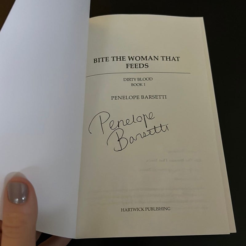 Bite The Woman That Feeds - signed copy with bookmarks 