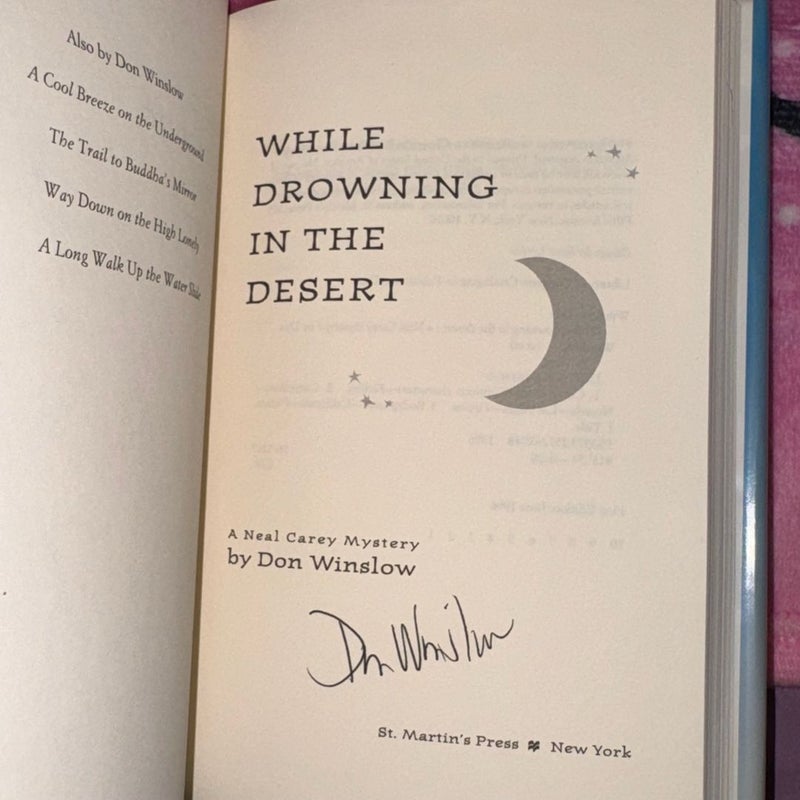 WHILE DROWNING IN THE DESERT SIGNED