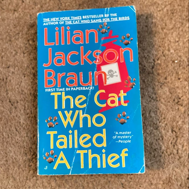 The Cat Who Tailed a Thief 