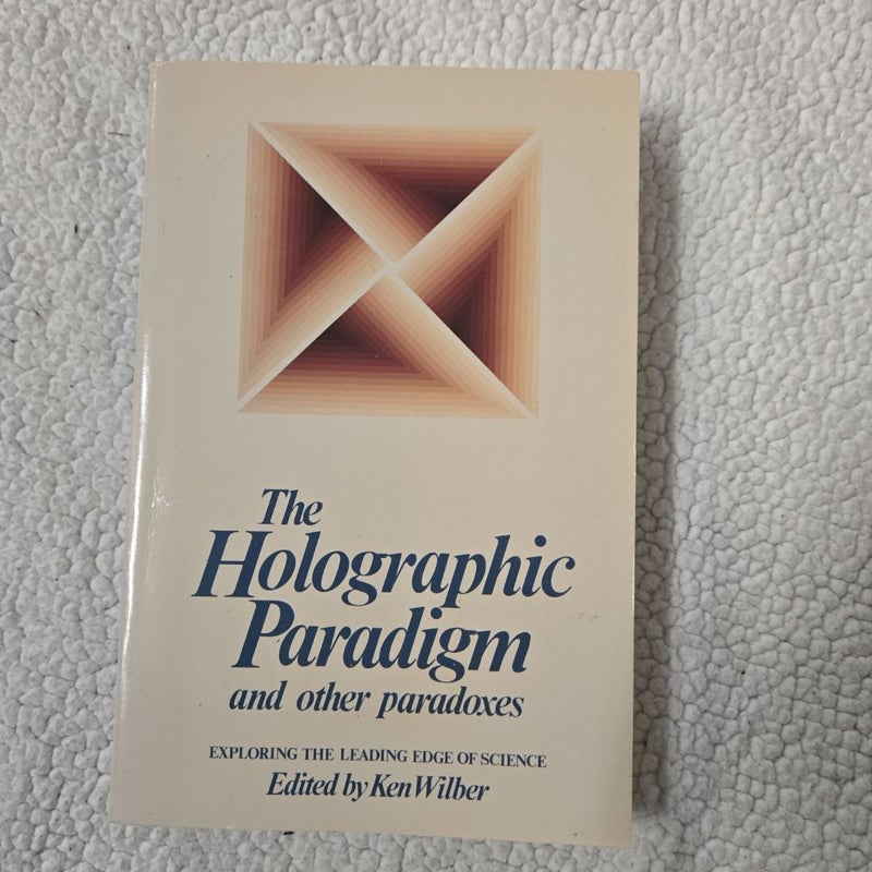 The Holographic Paradigm and Other Paradoxes