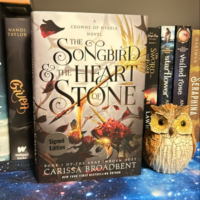 The Songbird and the Heart of Stone SIGNED