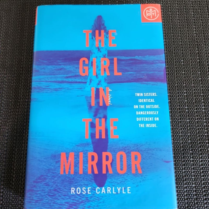 The Girl in the Mirror