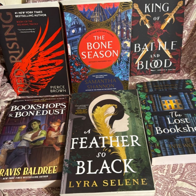 The bone season • Red Rising • king of Battle & Blood • The Lost Bookshop • bookshops & bonedust