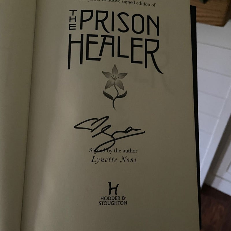 Signed copy of The Prison Healer Fairyloot Edition