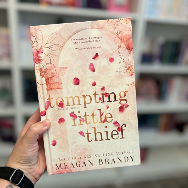 Tempting little thief by Meagan Brandy , Hardcover | Pangobooks