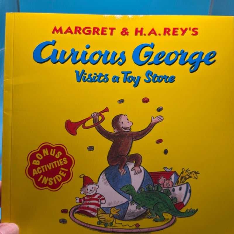 Curious George visits a toy store