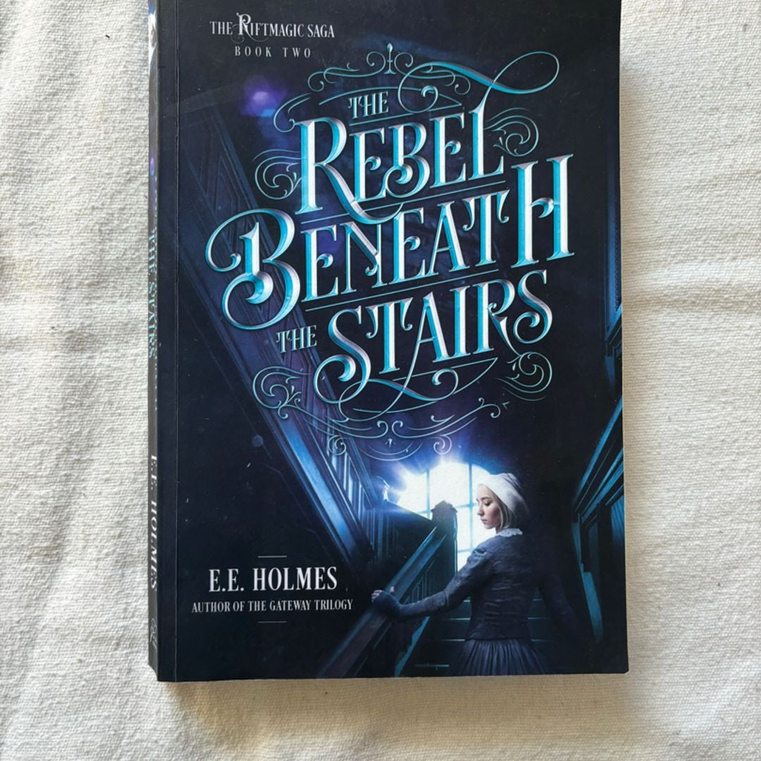 The Rebel Beneath the Stairs by E. E. Holmes