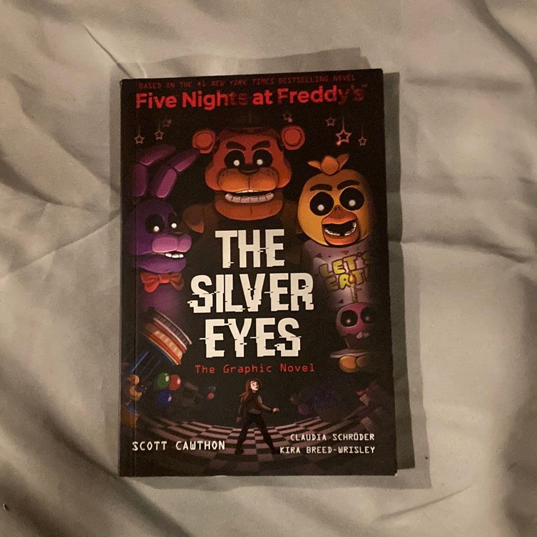 The Silver Eyes (Five Nights at Freddy's Graphic Novel #1) (Five Nights at  Freddy's Graphic Novels): Cawthon, Scott, Breed-Wrisley, Kira, Schröder,  Claudia: 9781338298482: : Books