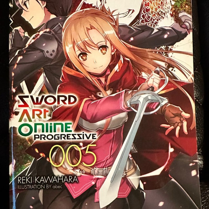 Two Books, Sword Art Online 005 and Alice In The Country Of Clover