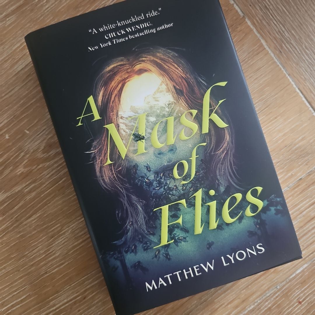 A Mask of Flies