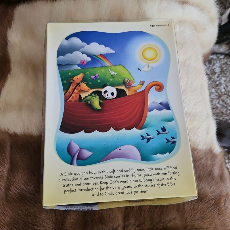 Baby's hug a bible