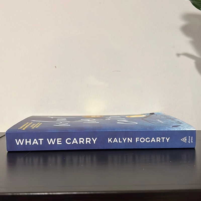 What We Carry (Signed)