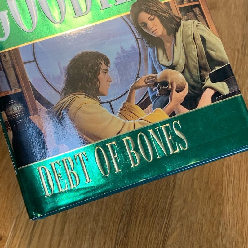 Debt of Bones (First Edition)