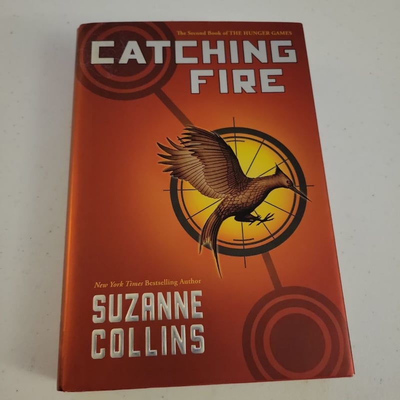Catching Fire by Suzanne Collins, Hardcover | Pangobooks