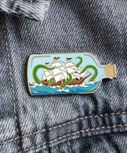 Pirate ship and monster enamel pin