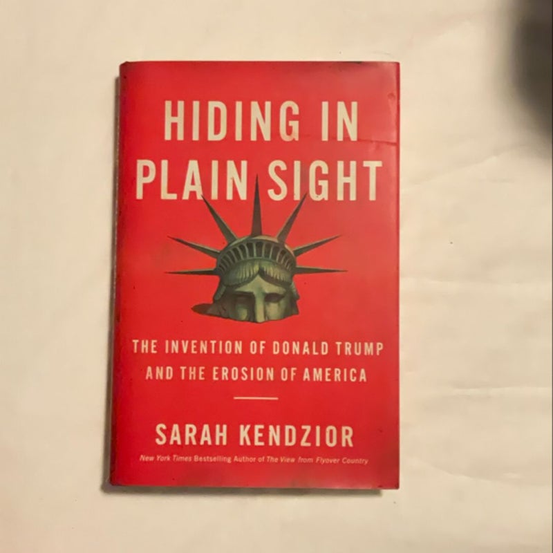 Hiding in Plain Sight : the Invention of Donald Trump and the Erosion of America