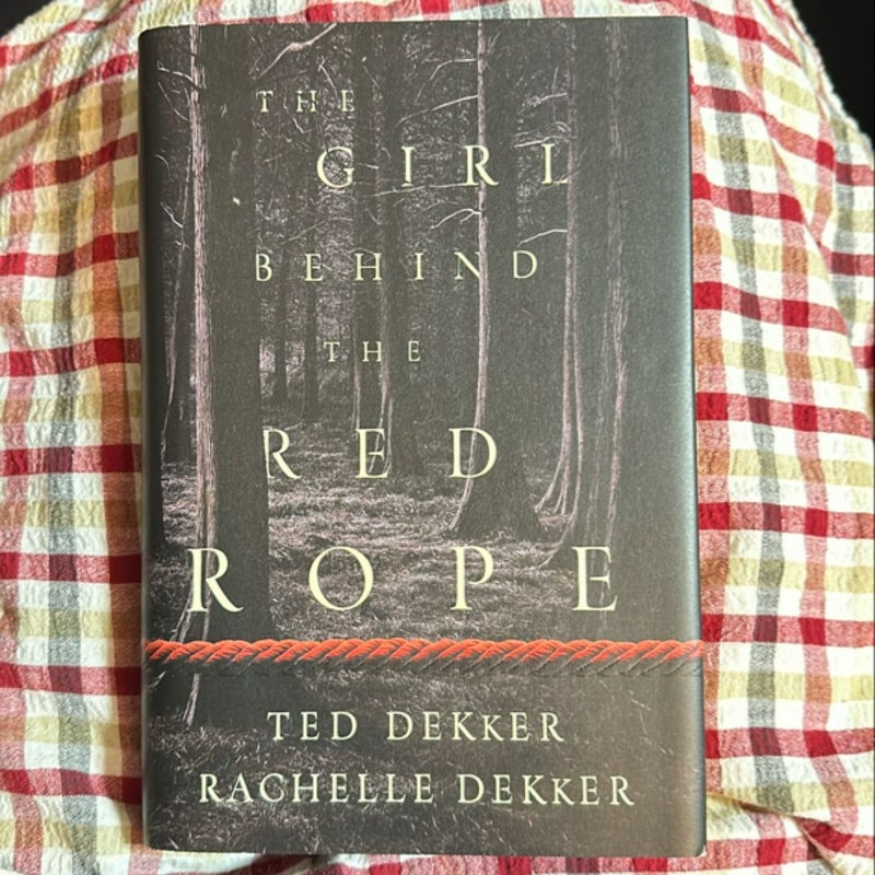 The Girl Behind the Red Rope