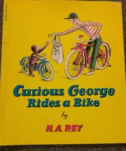 Curious George rides a bike 
