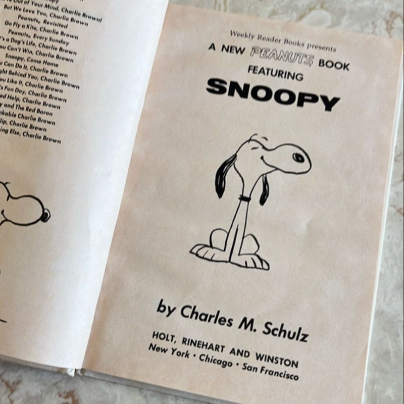 Snoopy: A Peanuts Book