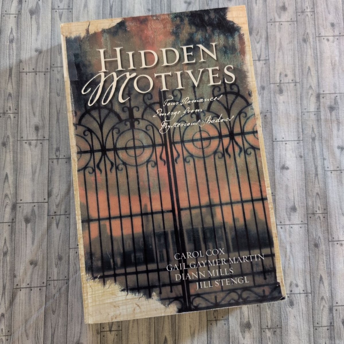 Hidden Motives by Carol Cox, Gail G. Martin, DiAnn Mills, Jill Stengl