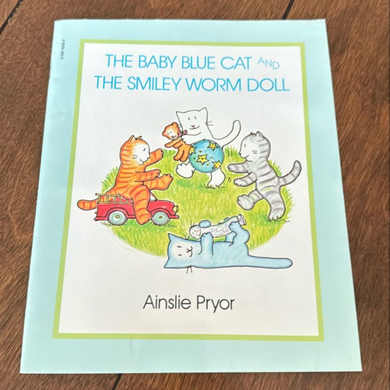 The Baby Blue Cat and the Smiley Worm Doll