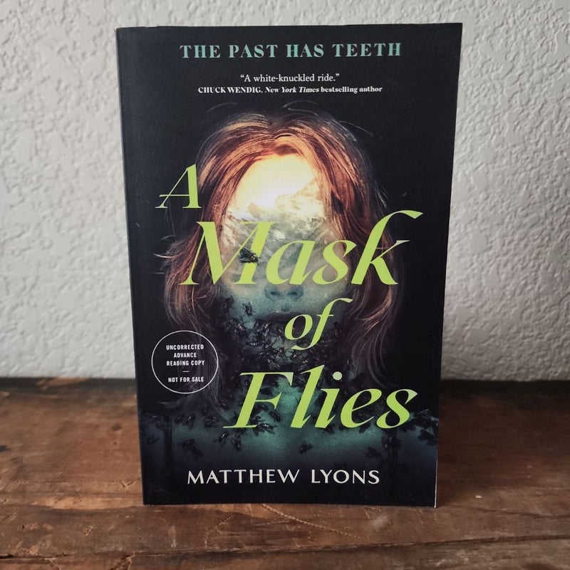 A Mask of Flies