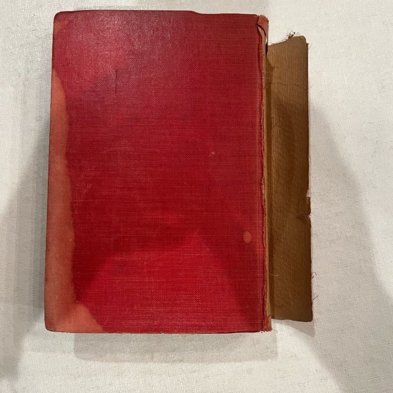 Antique Little Women red hardback book. By Louisa May Alcott. Used condition 