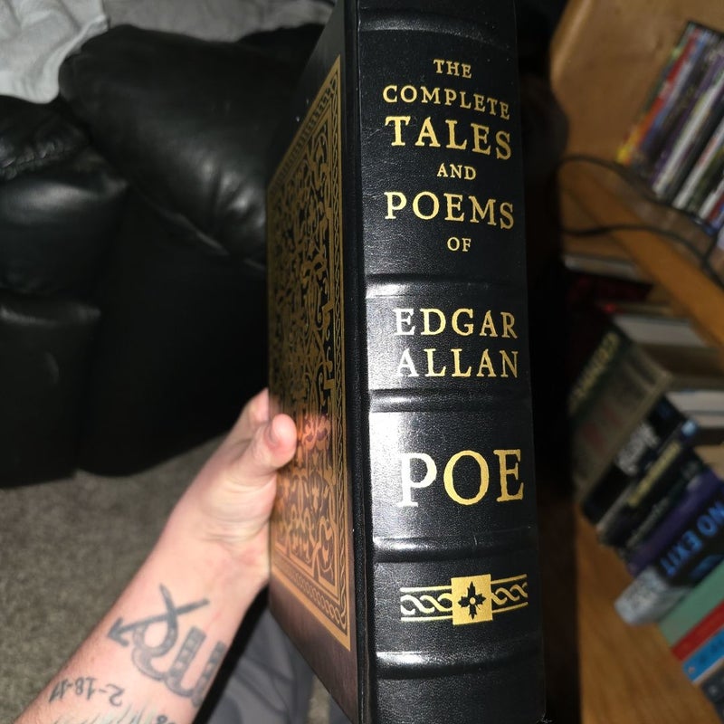 The complete tales and poems of Edgar Allen Poe with gold pages