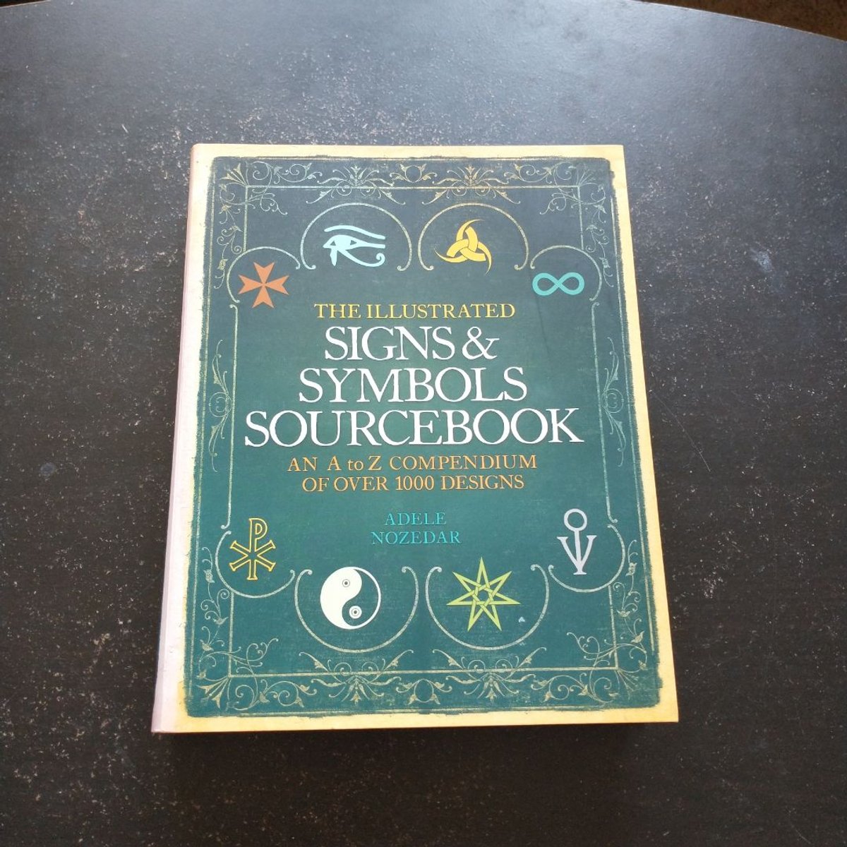The Illustrated Signs and Symbols Sourcebook by Adele Nozedar