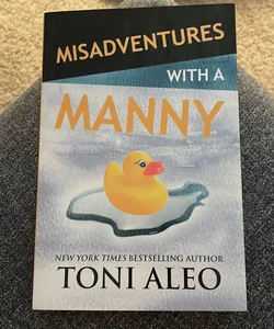 Misadventures with a Manny (signed by the author)
