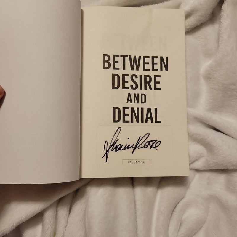 Between Desire and Denial (Signed Copy)