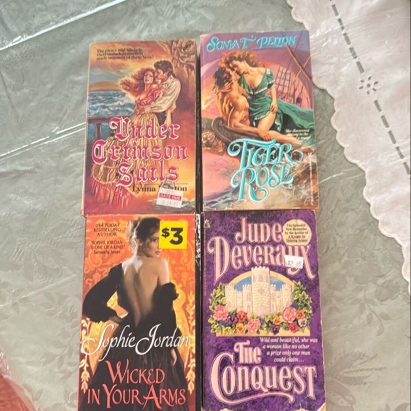 4 all different  books $ 2 each  4 for $6 