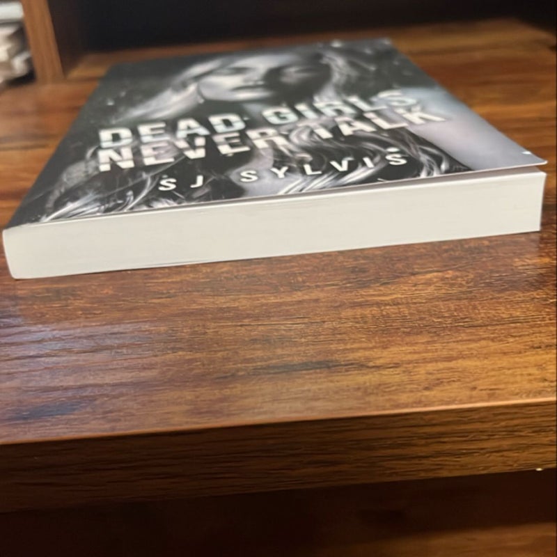 Dead girls never talk by SJ Sylvis
