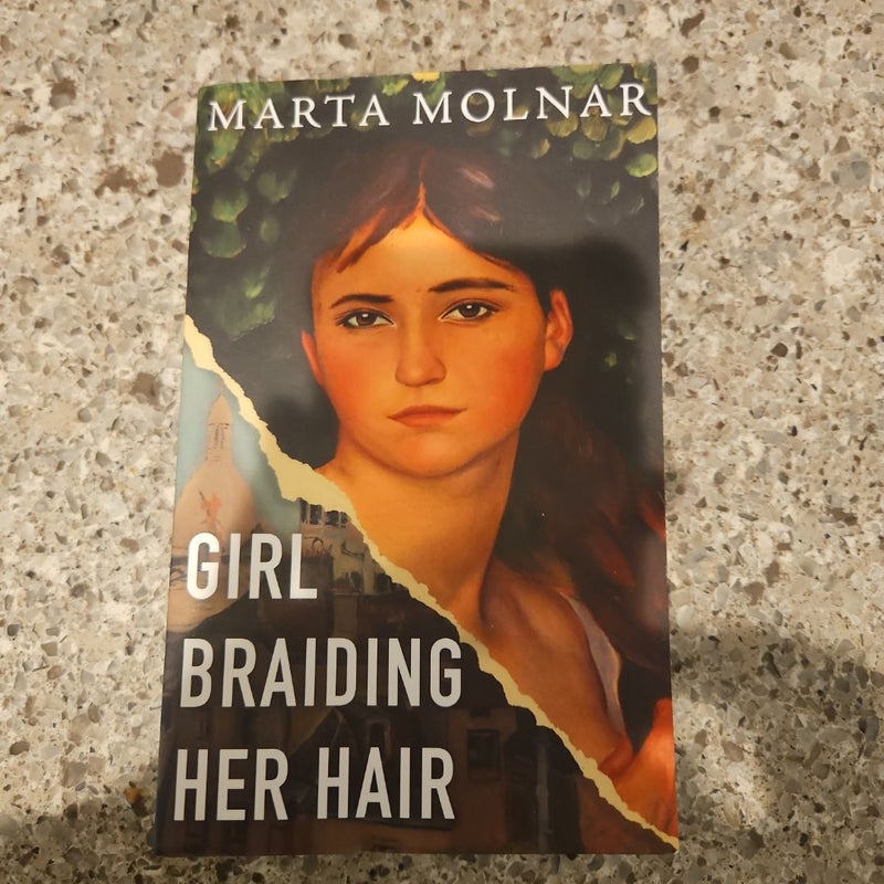 Girl Braiding Her Hair