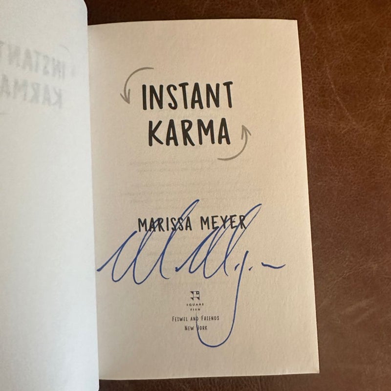 Instant karma signed by Marissa Meyer