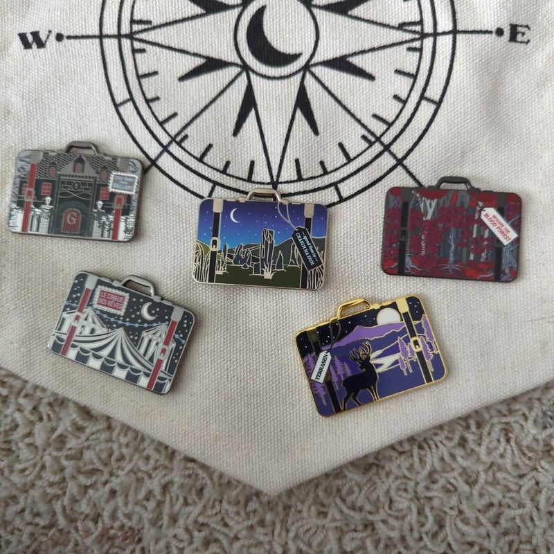 10 Owlcrate Literary Luggage Pins and banner
